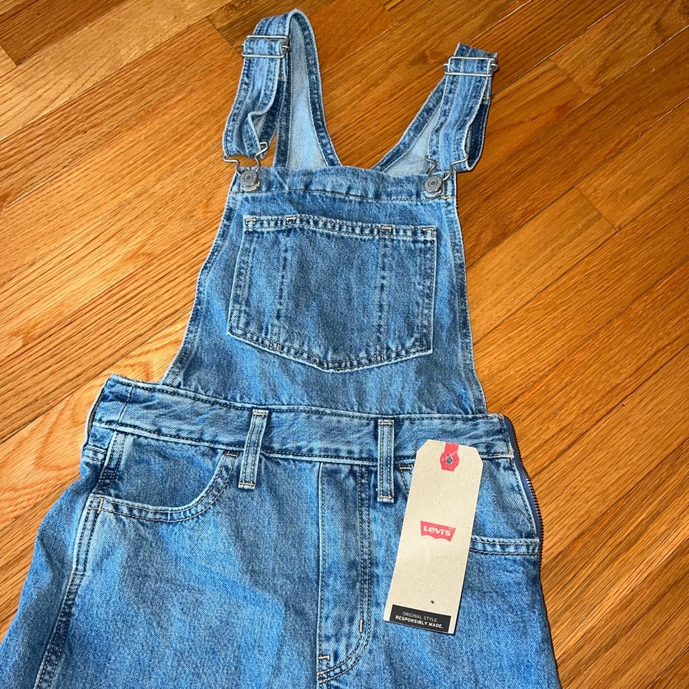 NWT Levi Overalls medium wash size 24